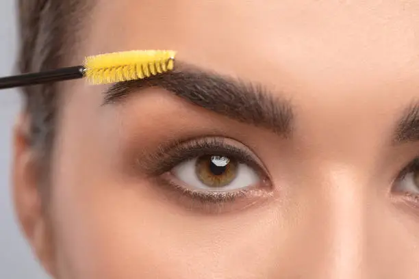 brush eyebrows